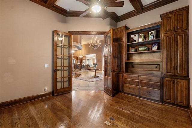 interior space featuring french doors, hardwood / wood-style floors, beam ceiling, and coffered ceiling