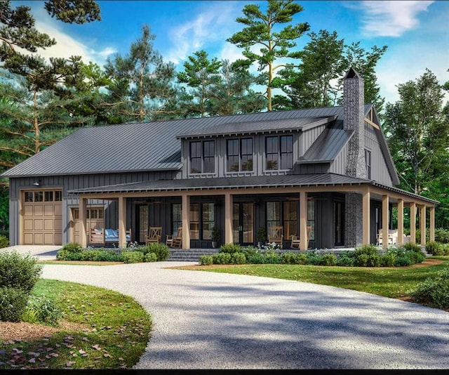 exterior space with covered porch and a garage