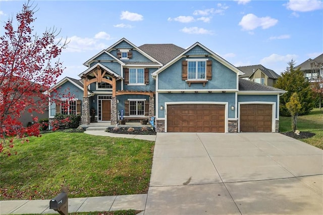 craftsman-style house with a front lawn and a garage