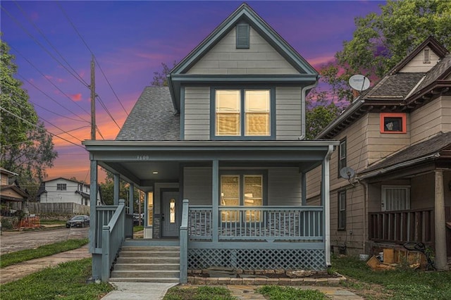 view of front of property featuring covered porch