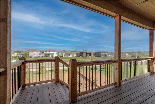 wooden deck with a residential view