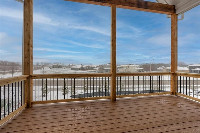 view of snow covered deck