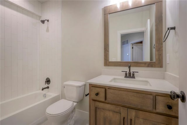 full bathroom featuring vanity, toilet, and tiled shower / bath