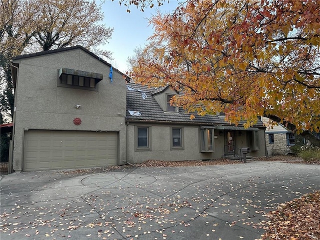 view of property featuring a garage