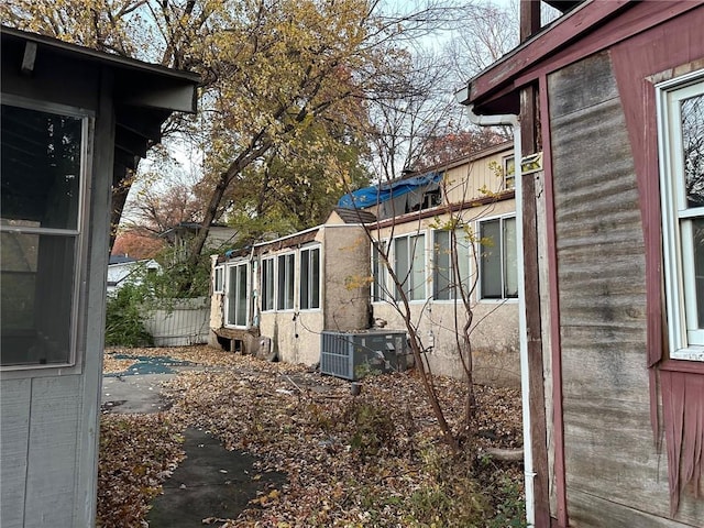 view of home's exterior featuring central air condition unit