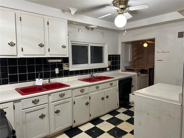 kitchen with white cabinetry, decorative backsplash, dishwasher, and sink