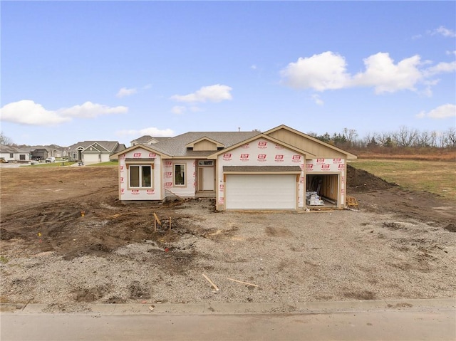 property under construction featuring a garage