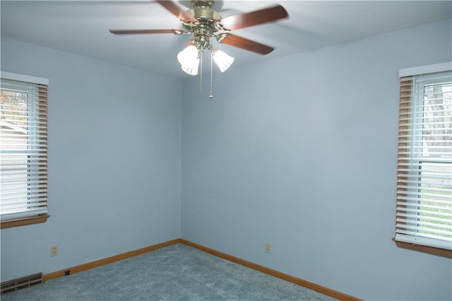 unfurnished room with carpet flooring and ceiling fan