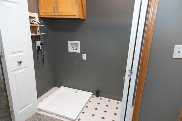 laundry room featuring cabinets and hookup for a washing machine