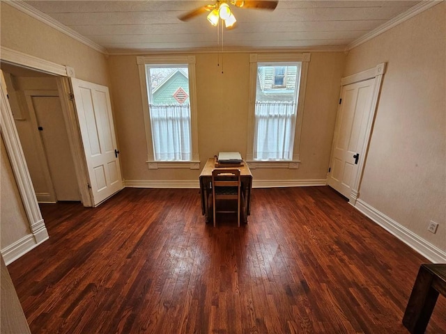 interior space with a wealth of natural light, crown molding, and dark wood-type flooring