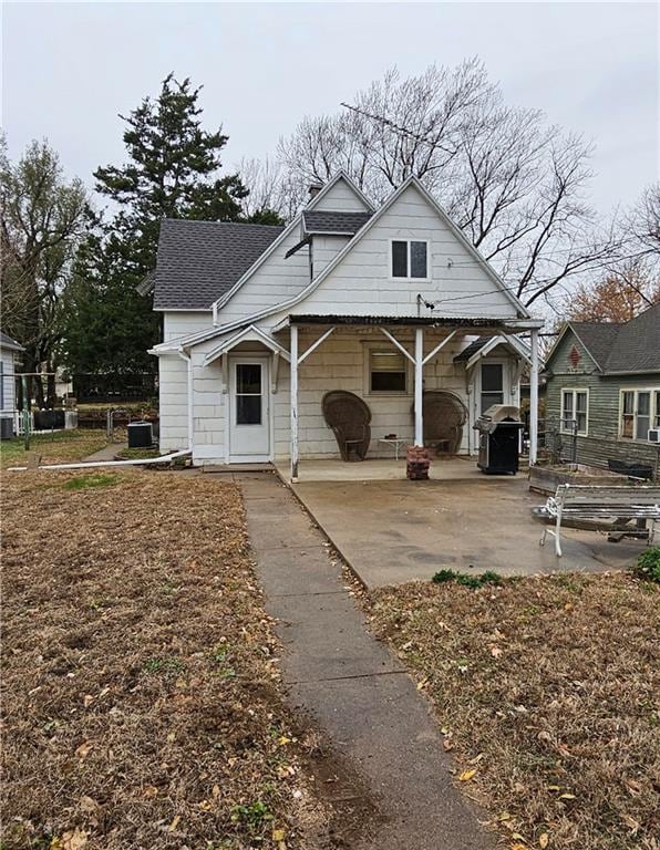 view of front of property with a patio