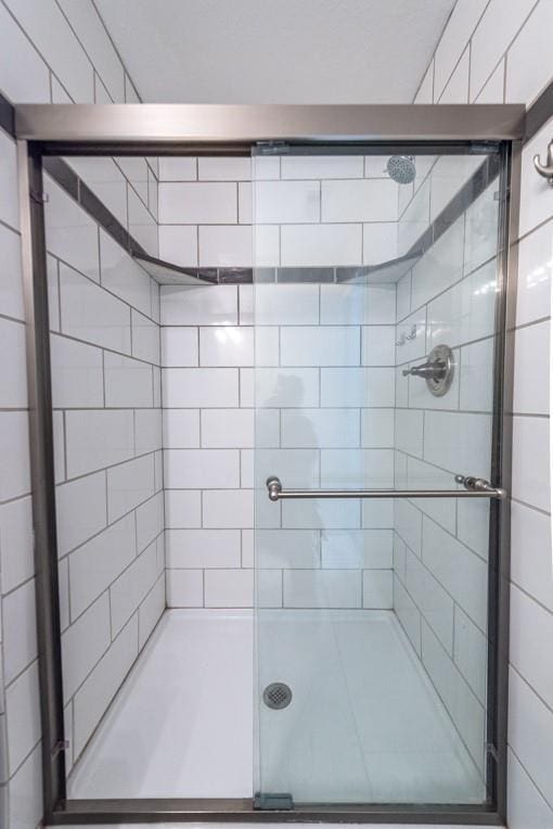 bathroom featuring walk in shower