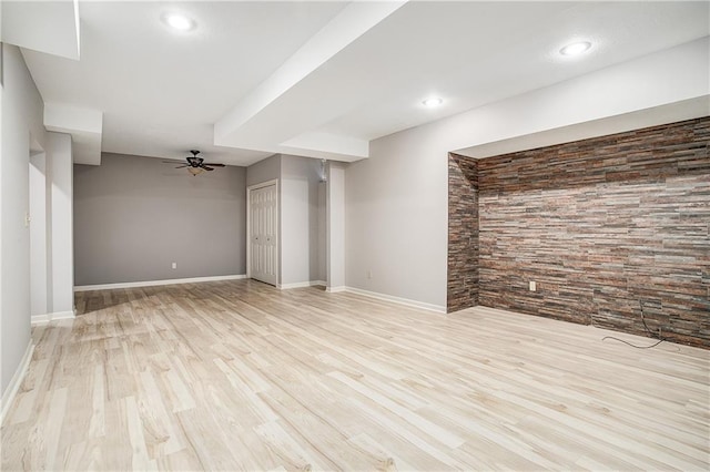 interior space with light hardwood / wood-style flooring and ceiling fan