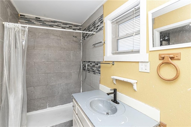 bathroom with a shower with shower curtain and vanity