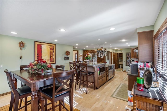 401 Taylor Rd, Independence, KS 67301 - dining room with recessed lighting and light wood-style flooring