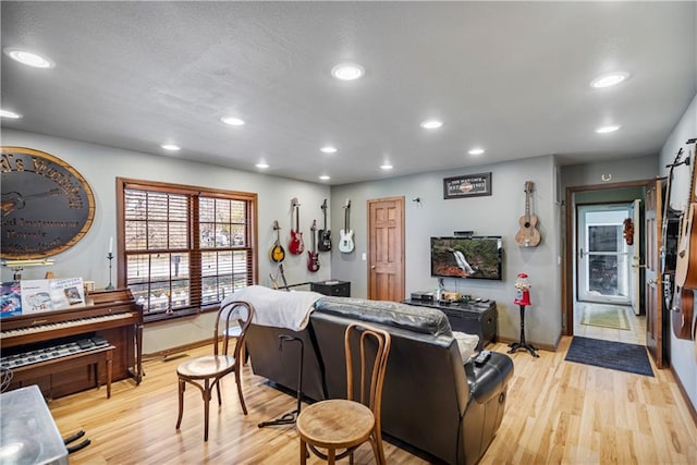 401 Taylor Rd, Independence, KS 67301 - living room with baseboards, light wood-type flooring, and recessed lighting