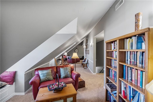 401 Taylor Rd, Independence, KS 67301 - living area featuring carpet flooring, lofted ceiling, and baseboards