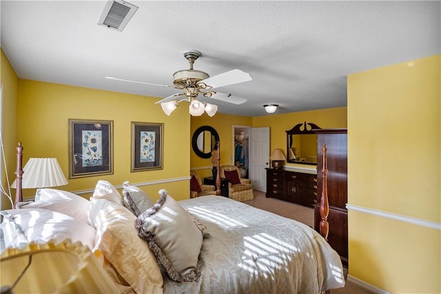 401 Taylor Rd, Independence, KS 67301 - carpeted bedroom featuring a spacious closet, a closet, and a ceiling fan