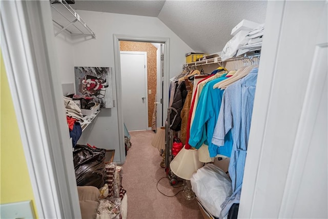 401 Taylor Rd, Independence, KS 67301 - walk in closet featuring carpet flooring and lofted ceiling