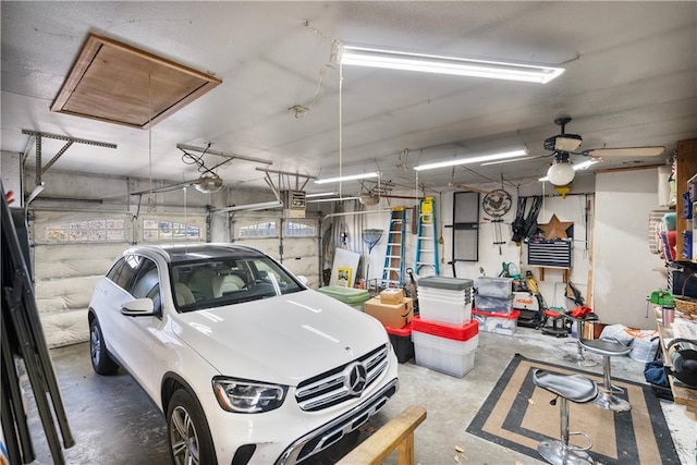 401 Taylor Rd, Independence, KS 67301 - garage featuring a garage door opener