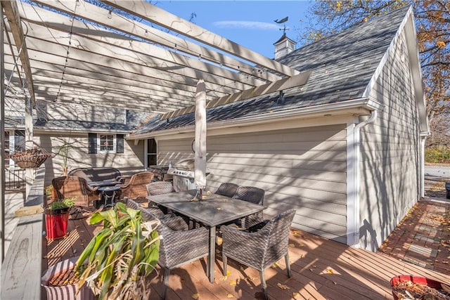 401 Taylor Rd, Independence, KS 67301 - wooden deck featuring a pergola and outdoor dining area