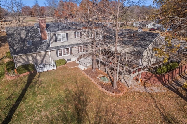 401 Taylor Rd, Independence, KS 67301 - back of property featuring a chimney and roof with shingles