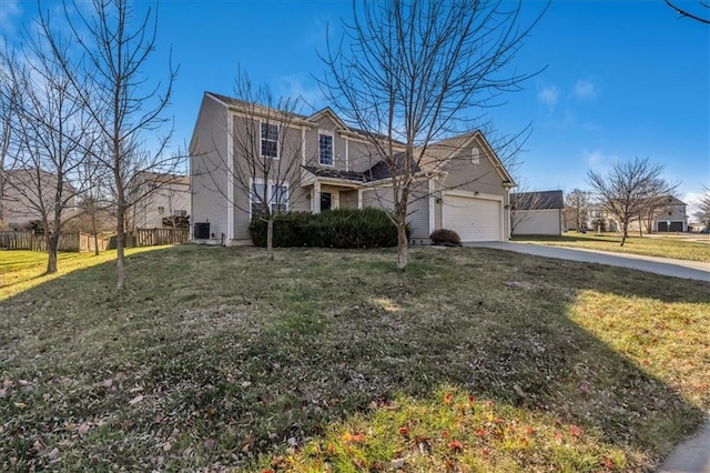 view of front property with a garage and a front lawn