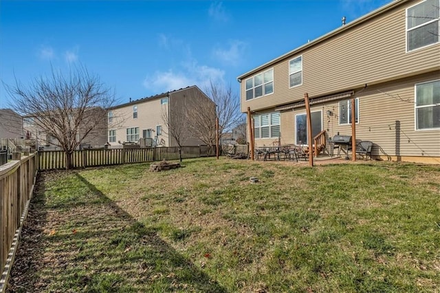 view of yard with a fenced backyard and a patio