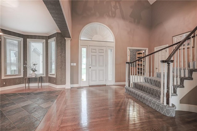 entrance foyer featuring a high ceiling