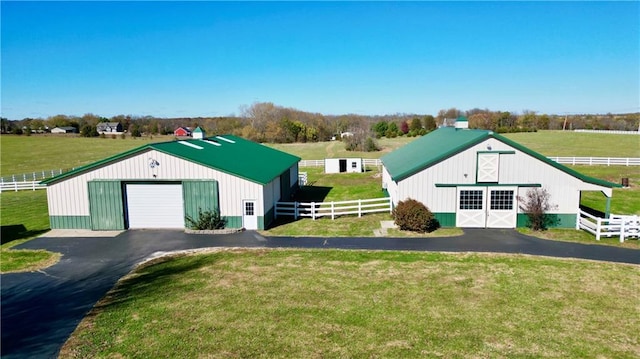 exterior space featuring a rural view