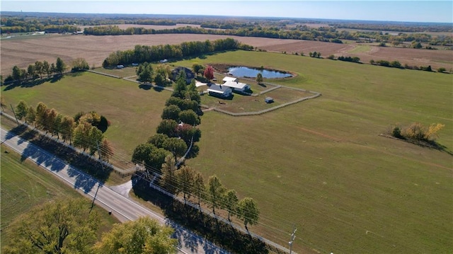 bird's eye view featuring a water view and a rural view