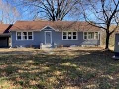 view of front of home with a front yard