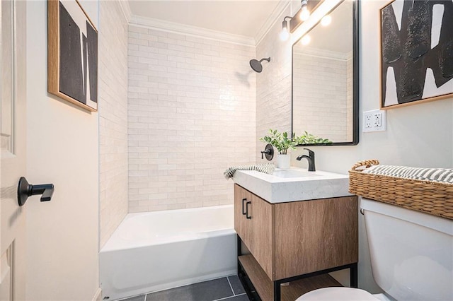 full bathroom featuring vanity, tiled shower / bath combo, crown molding, tile patterned flooring, and toilet