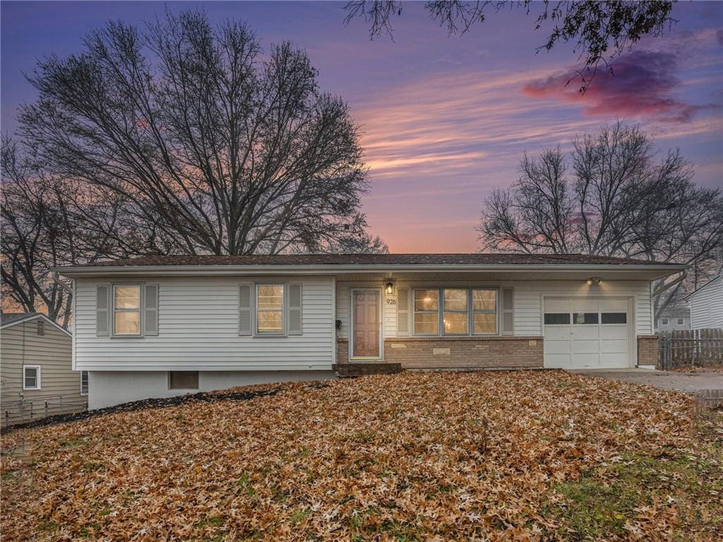 single story home featuring a garage