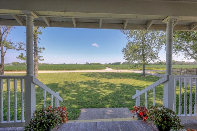 view of yard with a rural view