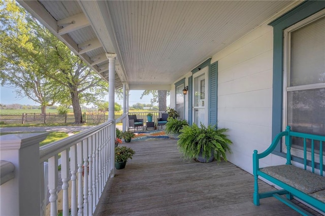 wooden terrace with covered porch