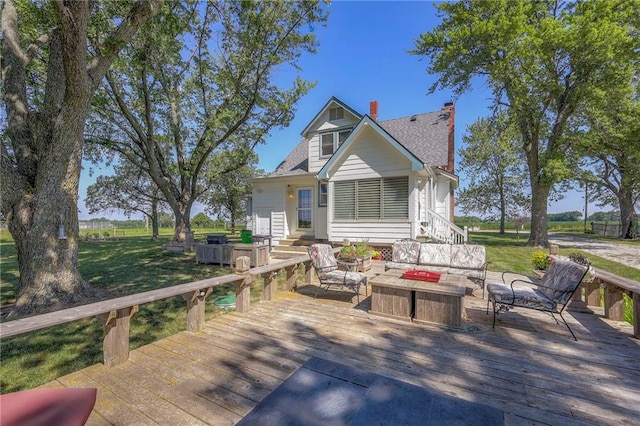 exterior space with a lawn and an outdoor hangout area