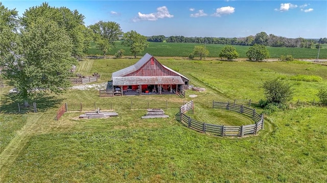 birds eye view of property featuring a rural view