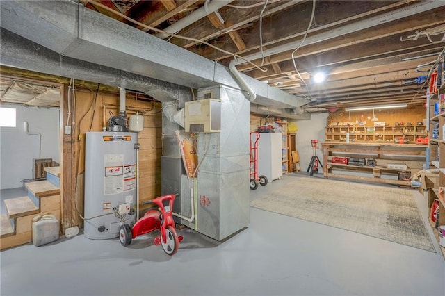 basement with heating unit and gas water heater