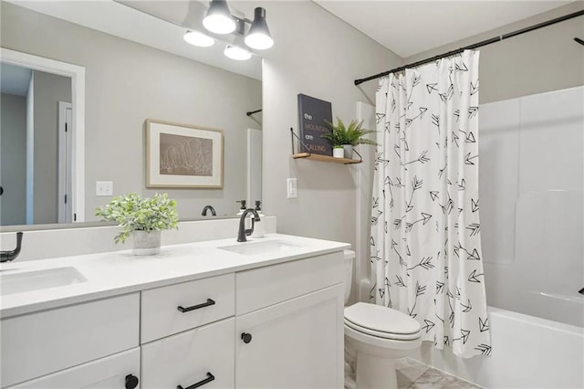 full bathroom featuring shower / bath combo with shower curtain, vanity, and toilet