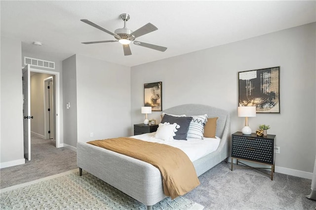 bedroom with ceiling fan and carpet