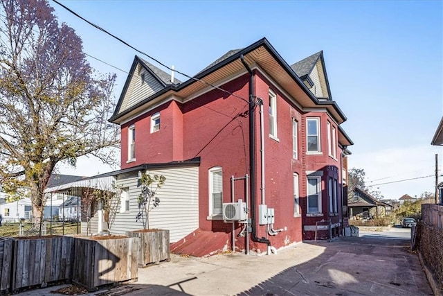 rear view of property with a patio area