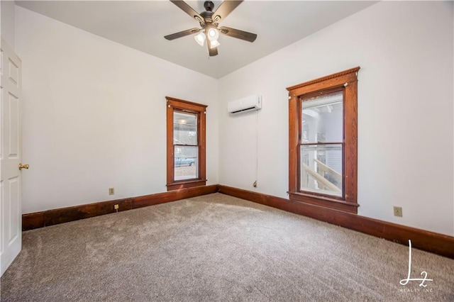 carpeted empty room with a wall mounted air conditioner and ceiling fan