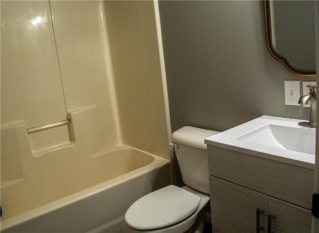 full bathroom featuring shower / tub combination, vanity, and toilet