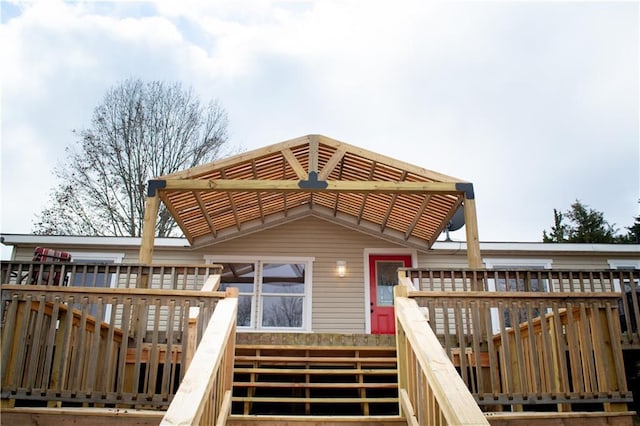 exterior space featuring a wooden deck