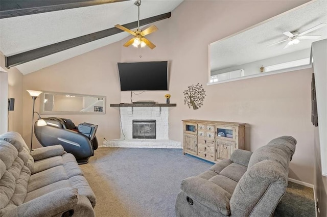 carpeted living room featuring lofted ceiling with beams, a fireplace, and ceiling fan