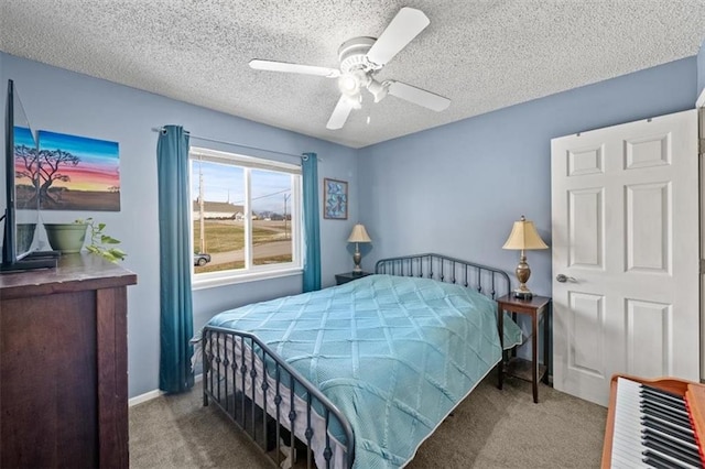 bedroom with light carpet, a textured ceiling, and ceiling fan