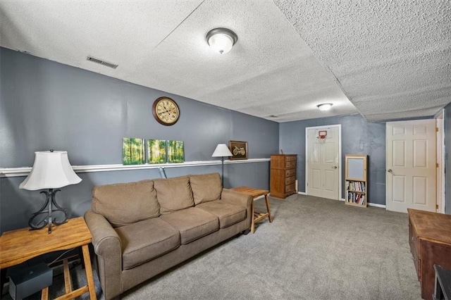 carpeted living room with a textured ceiling