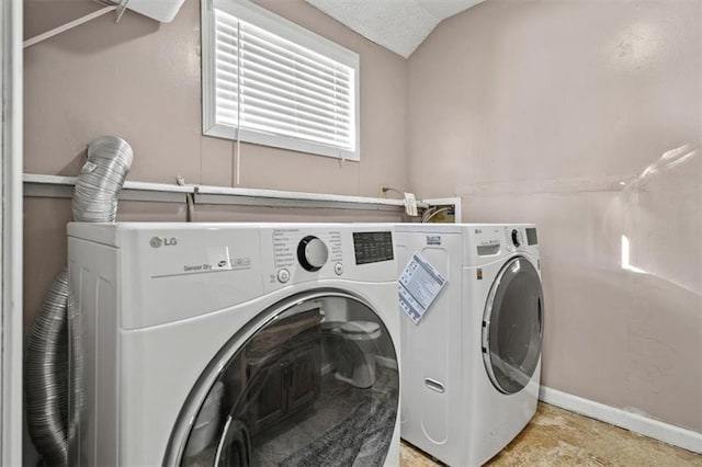 laundry area with independent washer and dryer