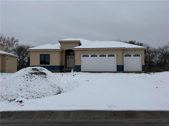 view of front of home featuring a garage